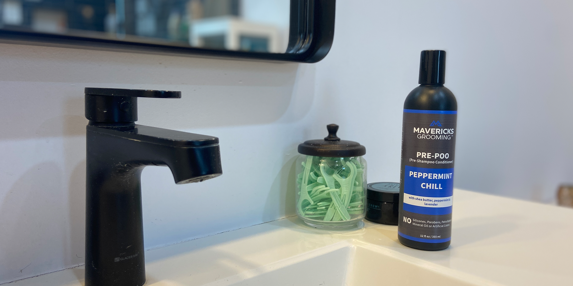 Mavericks Grooming's pre-shampoo conditioner bottle, the perfect addition to your men's grooming essentials